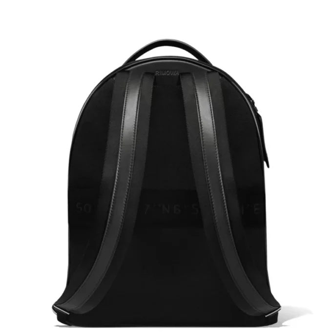 Mochila mediana de cuero y lona