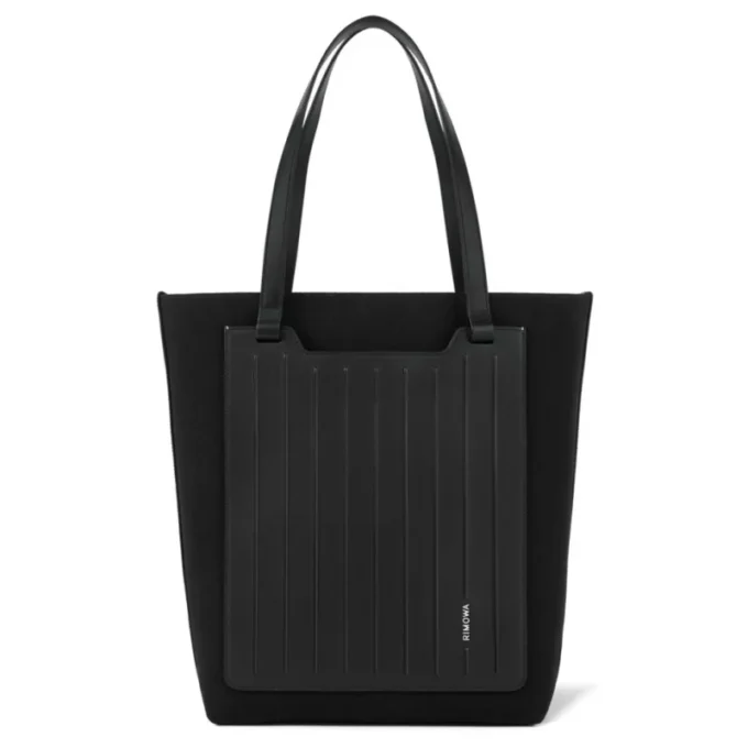 Never Still Vertical en cuero y lona TrageBags
