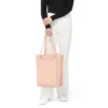Never Still Vertical en cuero y lona TrageBags