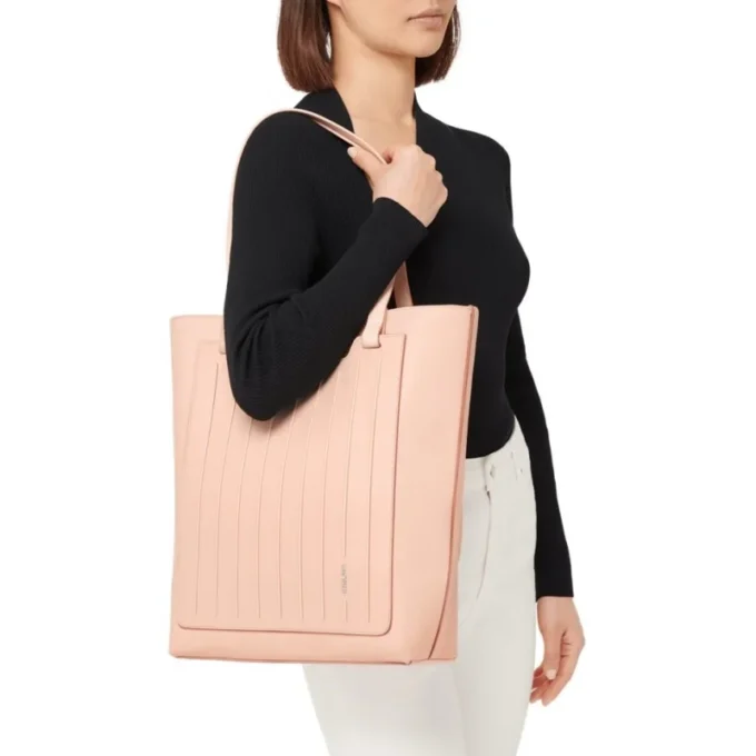 Never Still Vertical en cuero y lona TrageBags